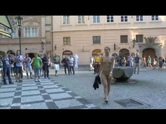 FreeKiloPorn presents: Naked young lady on a busy public street