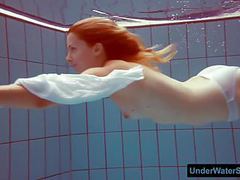 FreeKiloPorn presents: Redhead in a white dress and sexy bikini