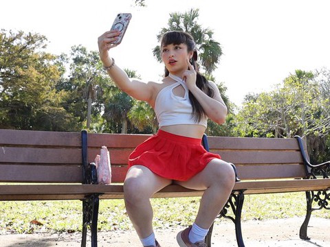 FreeKiloPorn presents: Gorgeous solo college babe doing striptease in a park - pixie