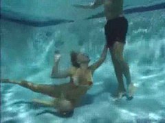 FreeKiloPorn presents: She has a threesome underwater