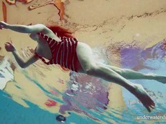 FreeKiloPorn presents: Small teen tits look even better underwater