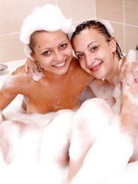 FreeKiloPorn presents: Naughty sexy young chicks taking a hot bubble bath together
