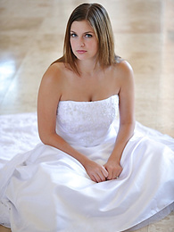 FreeKiloPorn presents: Busty glamorous amateur Danielle models wedding gown indoors & by the pool