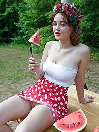 FreeKiloPorn presents: Nice belarusian stunner Rokki removes all clothes on a blanket in a backyard